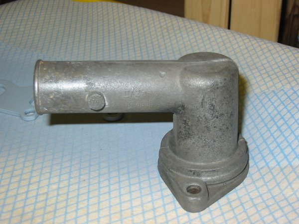 Thermostat housing Capri's Pinto thermostat housing cleaned up
