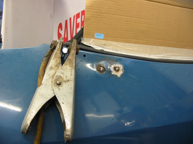 Welding up the old door mirror holes on the Capri