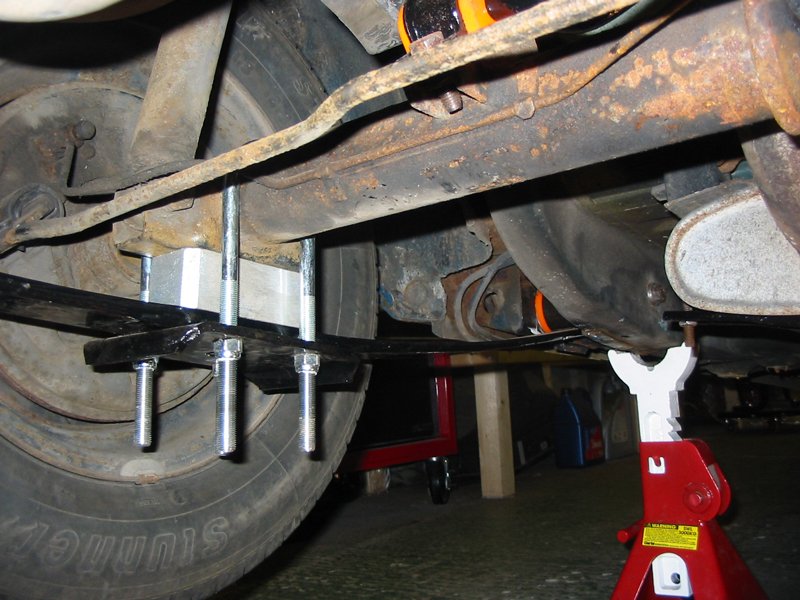 Single leaf rear spring with 1.5" one and a half inch lowering block on Capri