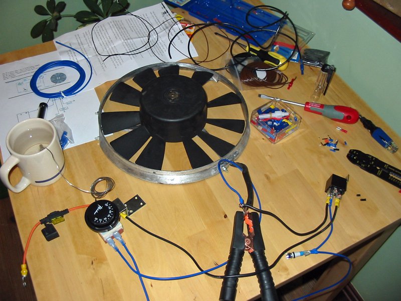 High tech test bench Escort radiator fan wired up on the bench